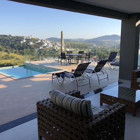 Suites De Luxo Paraiso De Minas Escarpas กาปีตอลิโอ ภายนอก รูปภาพ