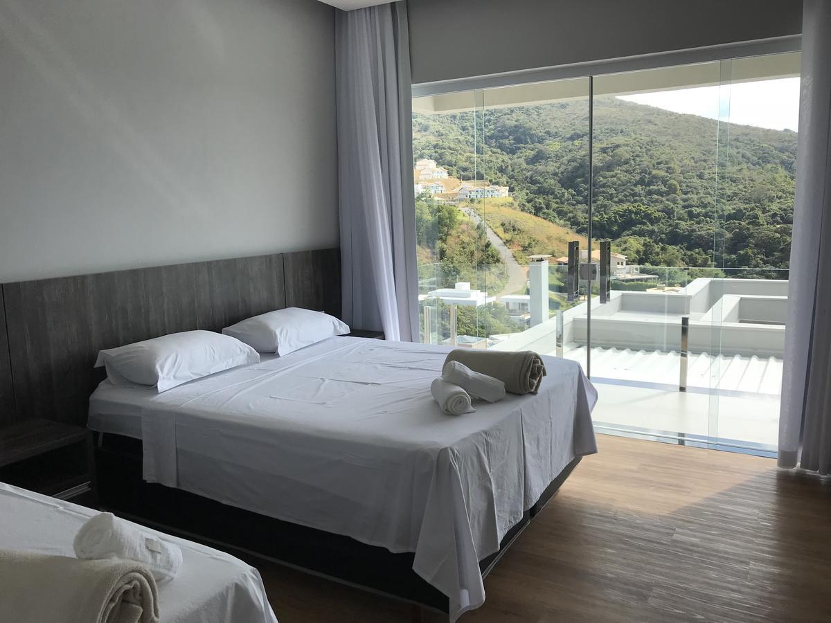 Suites De Luxo Paraiso De Minas Escarpas กาปีตอลิโอ ภายนอก รูปภาพ