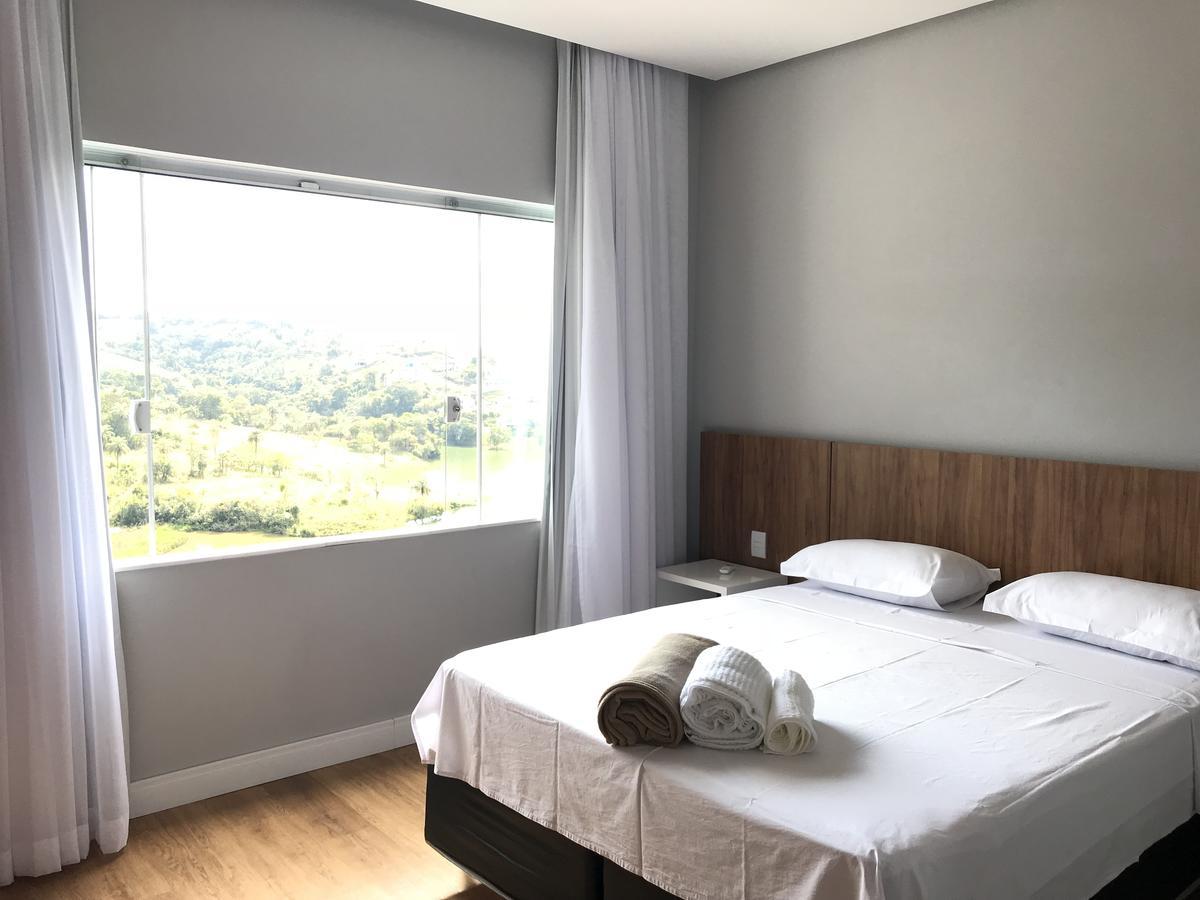 Suites De Luxo Paraiso De Minas Escarpas กาปีตอลิโอ ภายนอก รูปภาพ